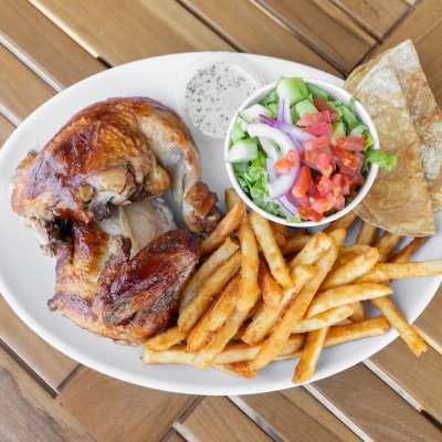 Half rotisserie chicken with French fries and house salad_Benny’s Tacos